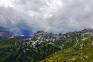 view to amazing mountain landscape and dense clouds