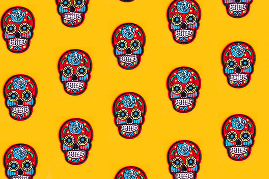 The creative pattern is made of Katrina's skull and yellow background. Day of the Dead is a Mexican holiday