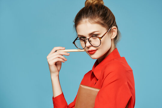 Business Woman Wearing Glasses Red Shirt Notepad With Pencil Blue Background