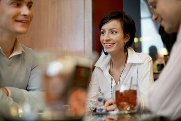 Business people talking at table in coffee shop