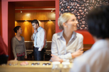 Business people relaxing in coffee shop