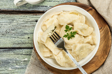 Dumplings with cottage cheese and sour cream
