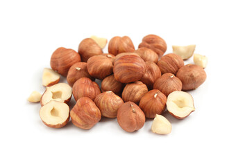 Heap of tasty hazelnuts on white background