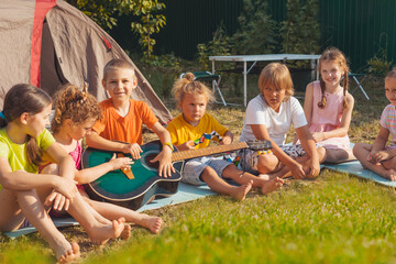 the children have a great time together in the backyard