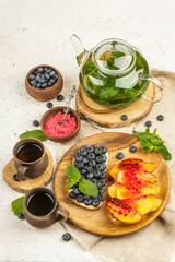 Tasty toast bread with cream cheese and ripe fruits