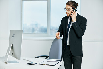 office worker documents in hand communication by phone executive