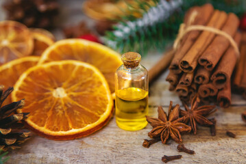 Christmas essential oils in small bottles. Selective focus.