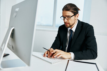 man in a suit in a suit office work phone executive