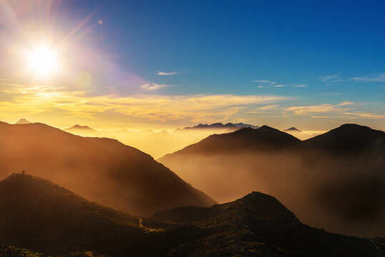 mountain landscape with haze at sunset. Mountain ranges of "Pe&ntilde;a villa" and "cuera" in Llanes, Asturias, Spain.