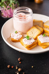 Smorrebrod sandwich butter spread shrimp on bread capelin caviar seafood fresh meal snack on the table copy space food background rustic 