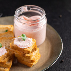 Smorrebrod sandwich butter spread shrimp on bread capelin caviar seafood fresh meal snack on the table copy space food background rustic 