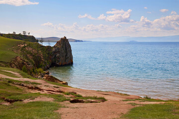 Lake Baikal, Olkhon Island on a summer day. Beautiful view of the Khuzhir Bay near the Shaman rock. 