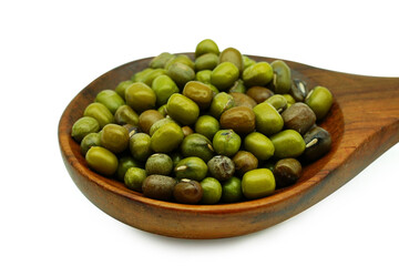 Mung bean (Vigna radiata) seeds in wooden spoon isolated on white background