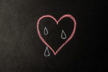 Obraz premium crying heart painted on chalk board
