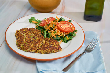 Tasty Quinoa vegetarian burgers made with quinoa, zucchini and onion.