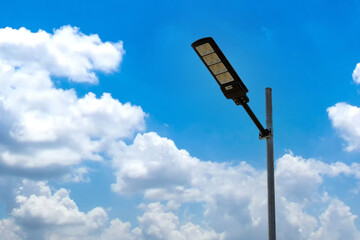 A modern street LED lighting pole. Urban electro-energy technologies. Poles on the road with LED...