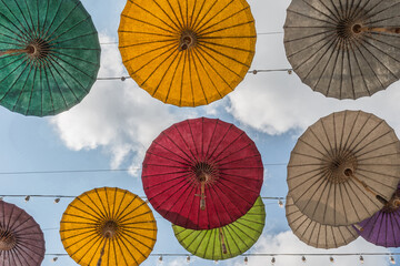 Paper Umbrella alley with blue sky in the background.