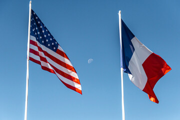 American and French Flags with moon in between