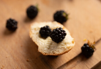 Snack with fresh blackberries. Selective focus.