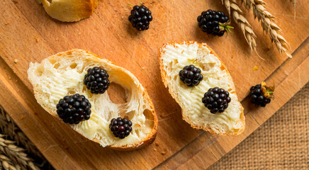 Snack with fresh blackberries. Selective focus.