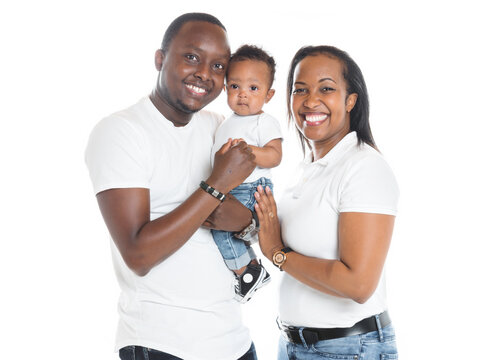 Young African American family in the studio with baby toddler son