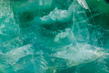 Macro mineral stone Fluorite crystal on a black background