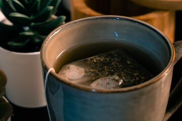 Cup of natural and healthy tea. Accessories for making tea.