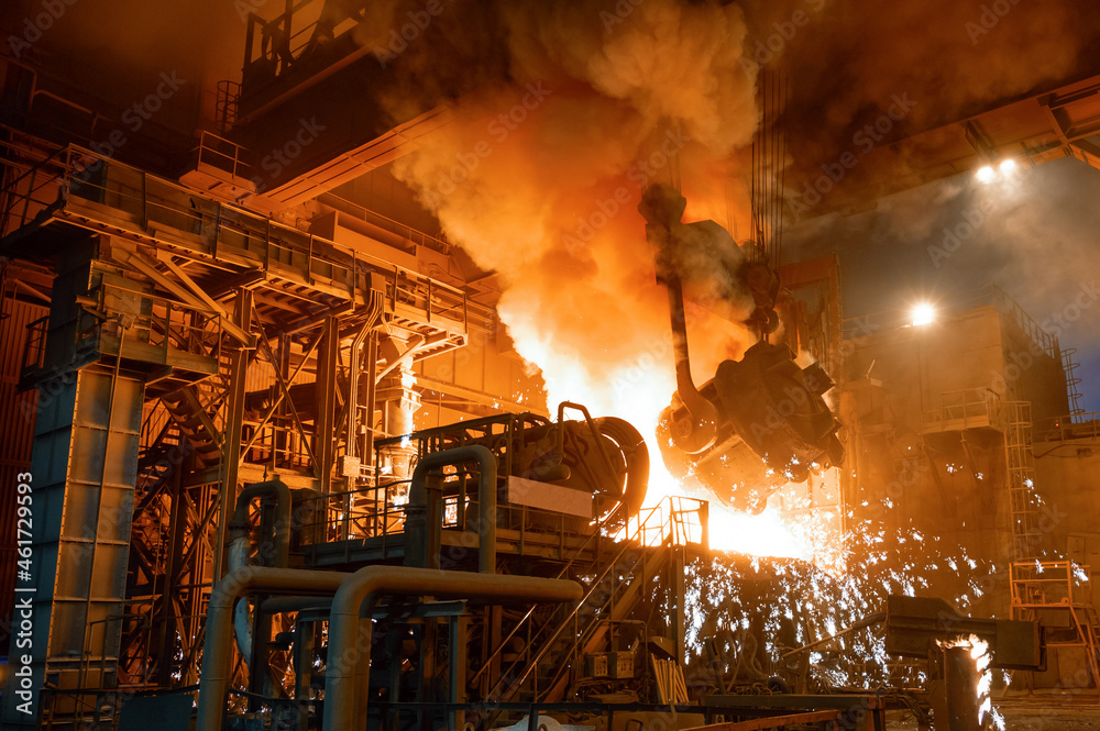 Wall mural pouring molten metal into a metallurgical electric arc furnace