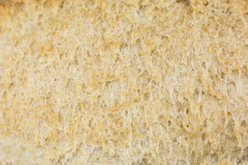 Fototapeta na wymiar Roasted Bread texture background. Loaf Bakery concept. Close up, macro photo. Beautiful natural wallpaper.