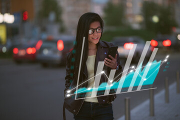 A young beautiful Asian woman is monitoring graphical and statistical data from her phone device, depicted as a holograph around her, while in the city street