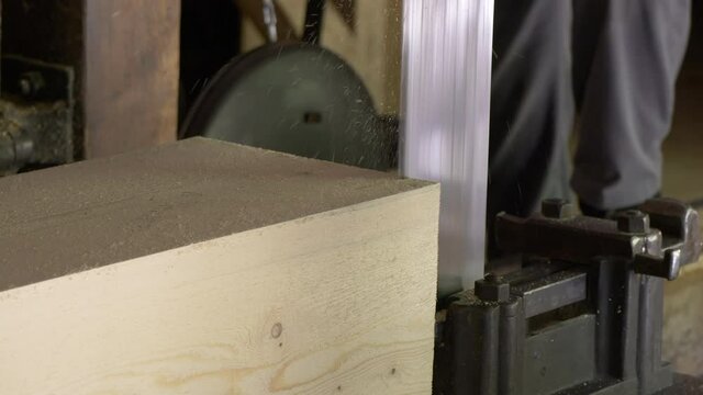 Sawtooth sawing block of wood in workshop factory,close up shot - prores footage