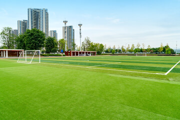 The football field and the cabin are in the park