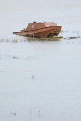 A boat appears to be stranded, but it's actually a play ground which has been flooded by the river IJssel
