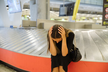 Frustrated woman lost baggage in airport