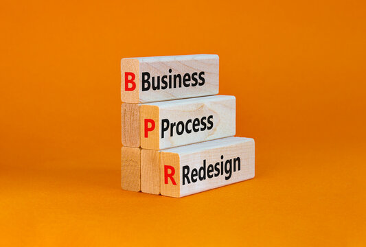 BPR business process redesign symbol. Concept words BPR business process redesign on blocks on a beautiful orange table, orange background. Business, BPR business process redesign concept. Copy space.