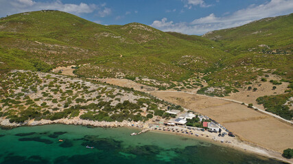 Fototapeta premium Aerial drone photo of beautiful sandy bay and picturesque small chapel of Agios Fokas in island of Skiros, Sporades, Greece