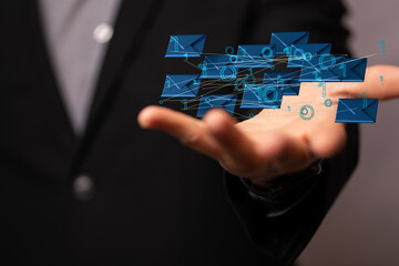 holding smartphone and checking email online on web with