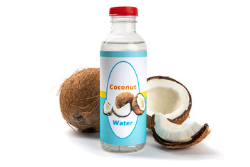 A fake generic labelled bottle of coconut water with broken up coconuts isolated on white

