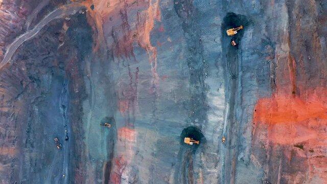 Aerial view of an open pit of iron ore. Resource mining