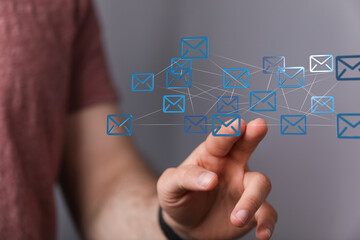 Abstract virtual postal envelopes sketch on blurry office buildings background, e-mail and marketing