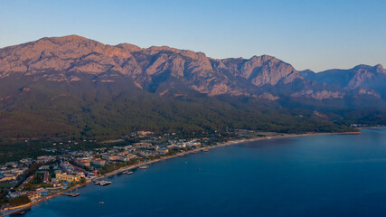 Fototapeta na wymiar Aerial view hotels on the Mediterranean coast on the Turkish Riviera in the vicinity of Kemer
