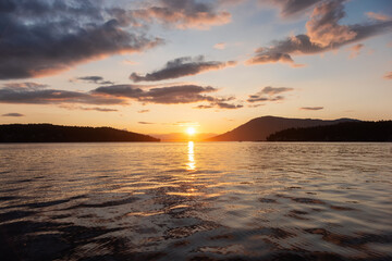 Canadian Nature Landscape View of the Gulf Islands on West Coast of Pacific Ocean. Dramatic Colorful Summer Sunset Located near Victoria, Vancouver Island, British Columbia, Canada.