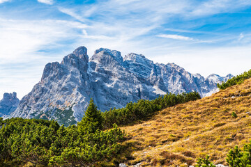 Autumn panorama on Monte Piana. View from the trenches to the three peaks of Lavaredo. Dolomites.