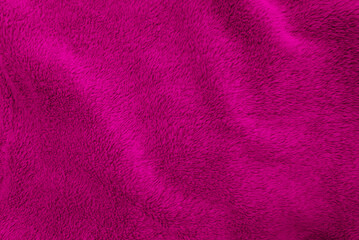 Magenta clean wool  texture background. light natural sheep wool. magenta seamless cotton. texture of fluffy fur for designers. close-up fragment magenta wool carpet.