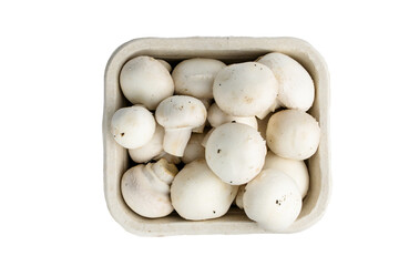 champignons mushrooms in cardboard pack, top view, isolatrd