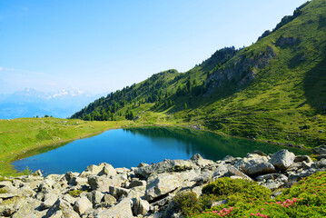 Mountain lake Lago di Chamole, Aosta valley, Italy. Summer landscape in the Alps.