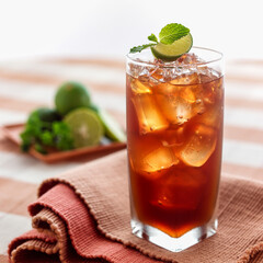 .Fresh cold ice tea with lime, mint and lemon , Selective focus.