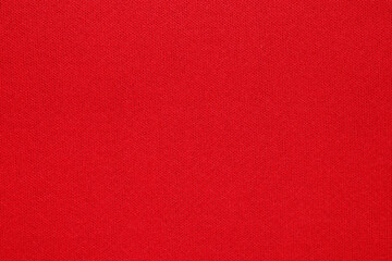 Red fabric texture background close up