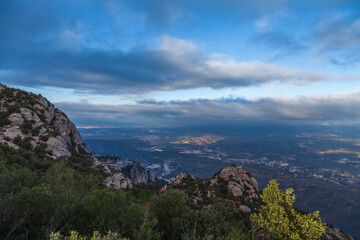 Fototapeta na wymiar Picturesque landscape with mountains. Landscape and beautiful sunset on Montserrat mountain. Rock formations and cliffs in the Catalan Natural Park of Montserrat. Barcelona, Catalonia, Spain