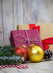 Christmas decorations toys gifts on a wooden background.